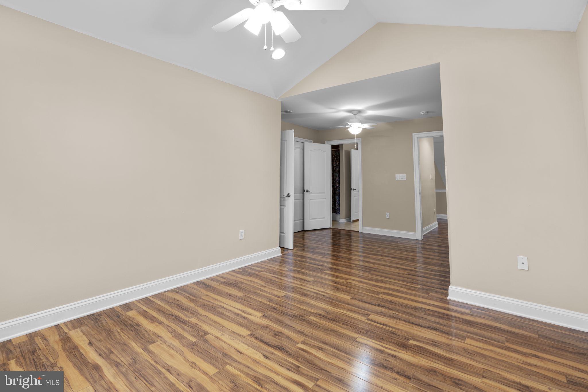 8024 Solley Road Glen Burnie, MD 21060 - Photo 52 of 83 a view of an empty room with wooden floor