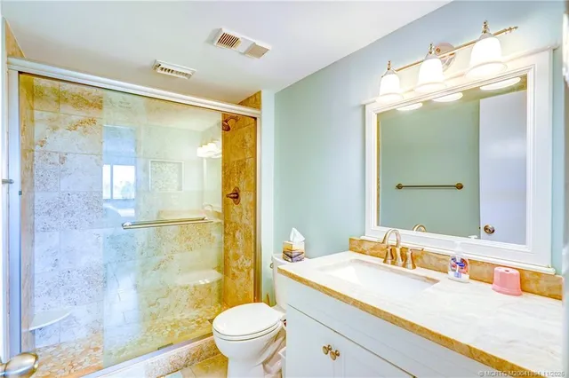 a view of a pool with a yard and outdoor