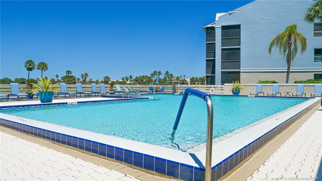 40 Northeast Plantation Road, Unit 209 Stuart, FL 34996 - Photo 29 of 36 a view of a balcony with chairs