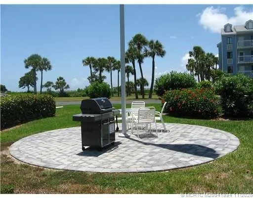 a view of a garden with a slide