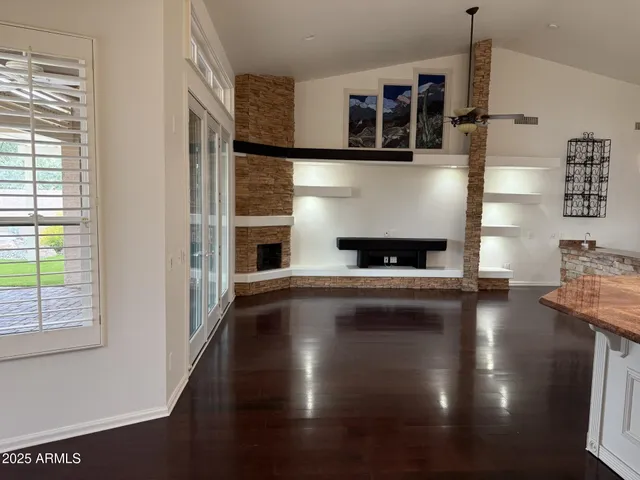 a view of living room with furniture and window
