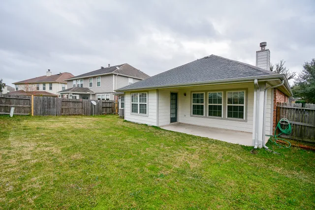 a view of a house with a garden