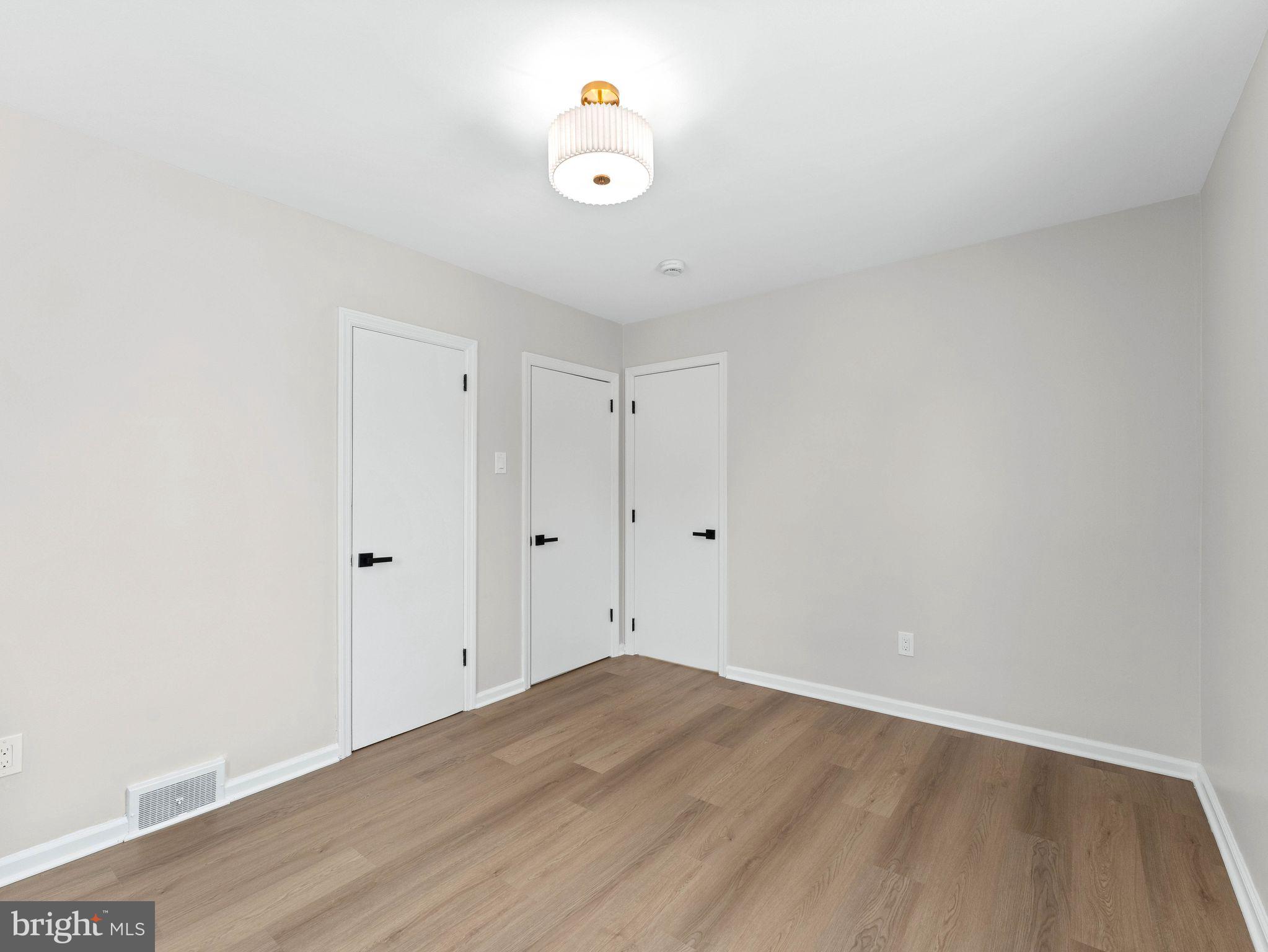 535 Main Street Glendora, NJ 08029 - Photo 19 of 33 a view of an empty room with wooden floor