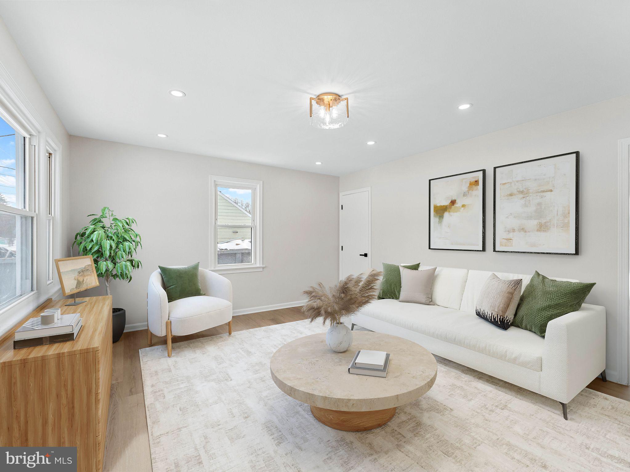535 Main Street Glendora, NJ 08029 - Photo 3 of 33 a living room with furniture and a potted plant