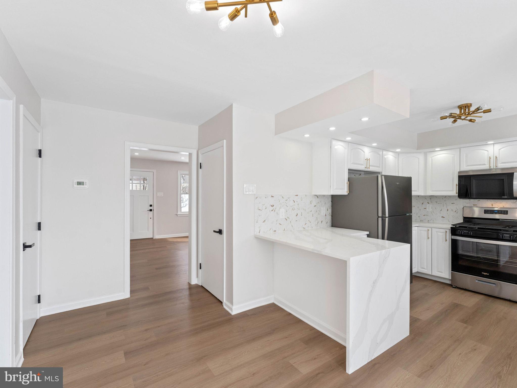 535 Main Street Glendora, NJ 08029 - Photo 8 of 33 a view of kitchen with wooden floor