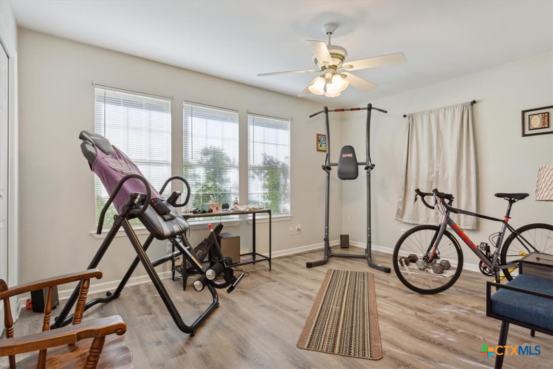 8 West Aztec Lane Belton, TX 76513 - Photo 27 of 37 a view of a yard with furniture window and wooden floor