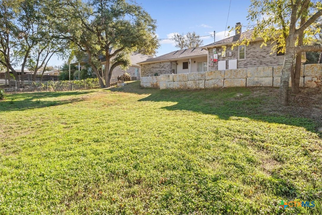 8 West Aztec Lane Belton, TX 76513 - Photo 35 of 37 a view of a house with a yard