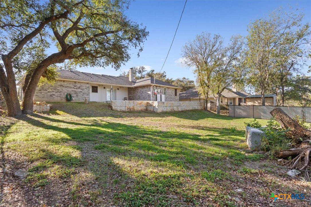 8 West Aztec Lane Belton, TX 76513 - Photo 37 of 37 a view of a house with a yard