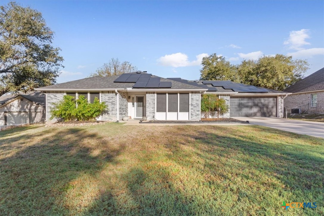 8 West Aztec Lane Belton, TX 76513 - Photo 5 of 37 a front view of a house with a yard