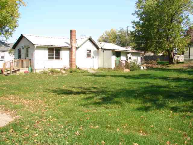 107 Jefferson Street Ridott, IL 61067 - Photo 3 of 10 a front view of a house with a yard