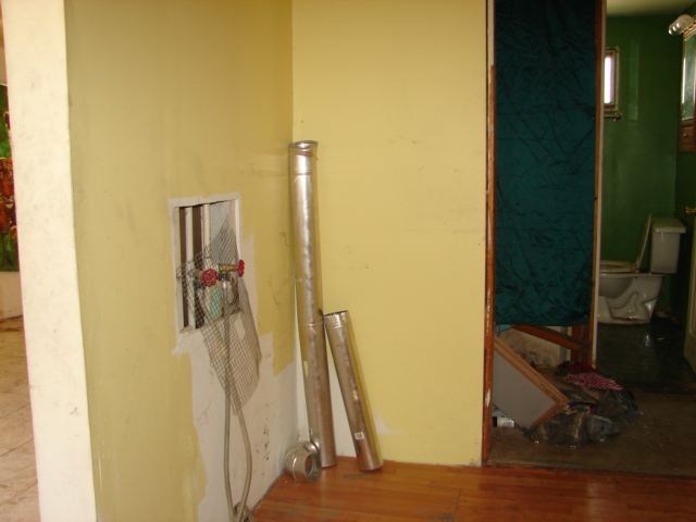 107 Jefferson Street Ridott, IL 61067 - Photo 6 of 10 a view of a gallery with wooden floor