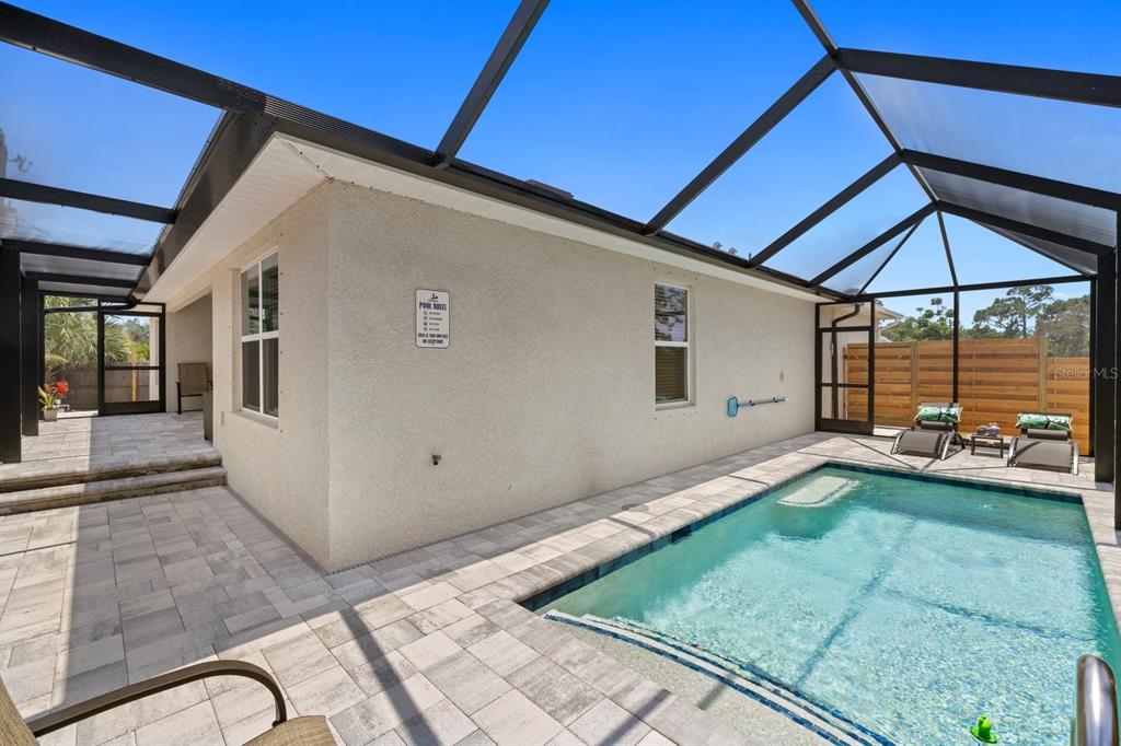 1190 Euclid Road Venice, FL 34293 - Photo 12 of 100 a backyard of a house with seating space