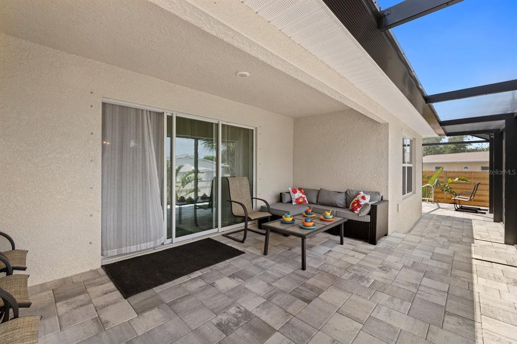 1190 Euclid Road Venice, FL 34293 - Photo 13 of 100 a living room with furniture and a large window