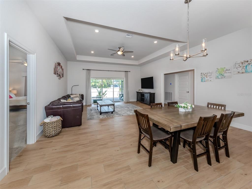 1190 Euclid Road Venice, FL 34293 - Photo 19 of 100 a view of a dining room with furniture and window