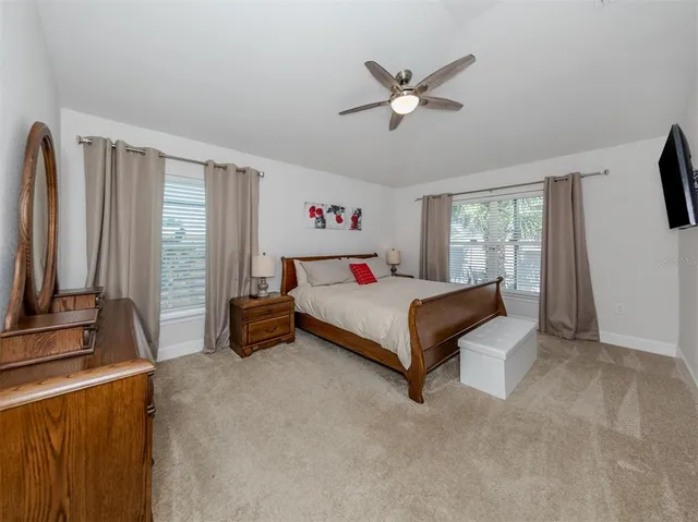 a view of chairs and tables in the patio