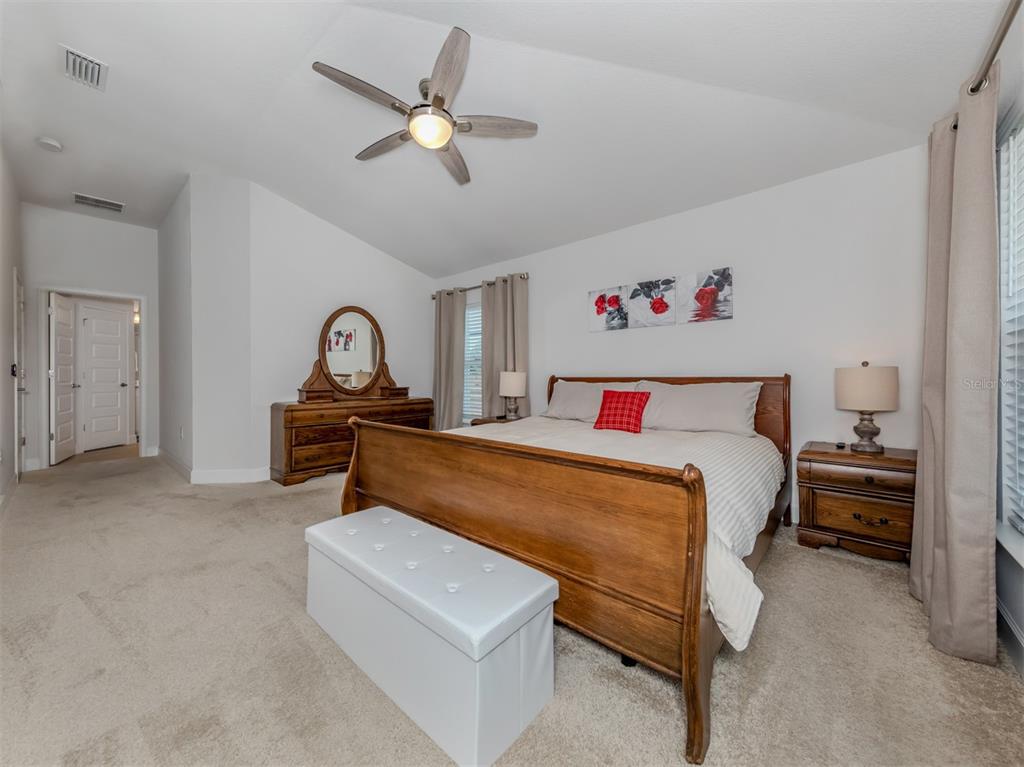 1190 Euclid Road Venice, FL 34293 - Photo 30 of 100 a bed room with a bed and a couch