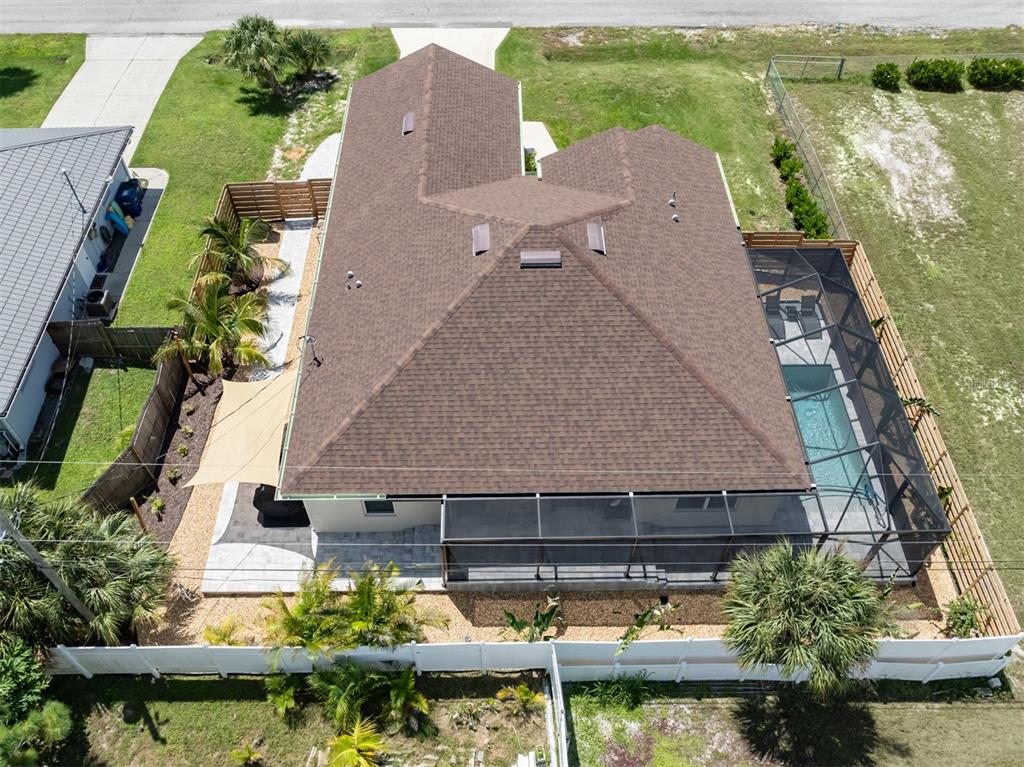 1190 Euclid Road Venice, FL 34293 - Photo 6 of 100 an aerial view of house with yard swimming pool and outdoor seating