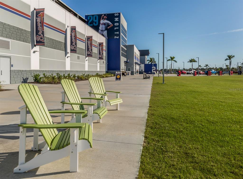 1190 Euclid Road Venice, FL 34293 - Photo 83 of 100 a view of swimming pool with outdoor seating and plants