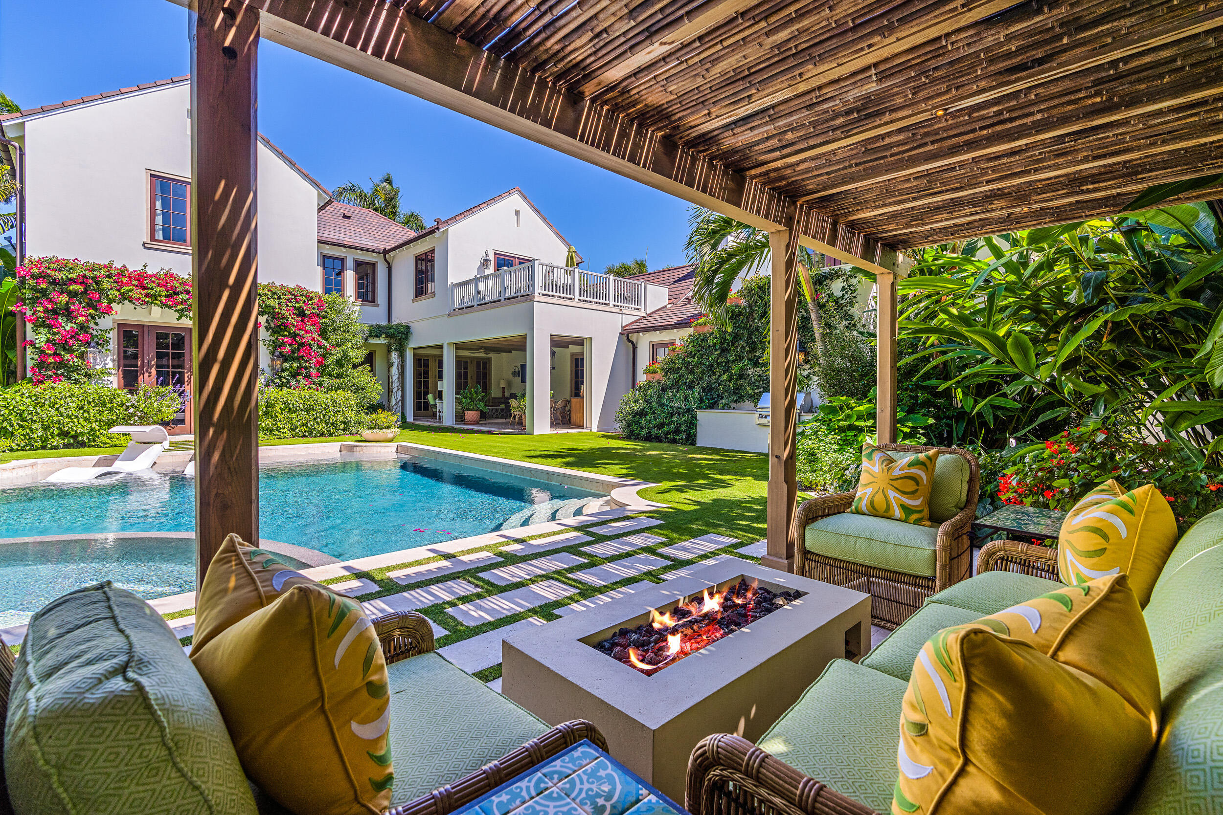 300 Indian Road Palm Beach, FL 33480 - Photo 13 of 42 a view of an chairs and tables in the patio