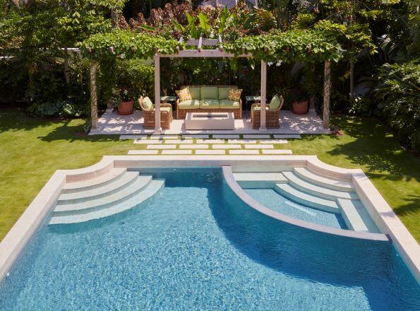 300 Indian Road Palm Beach, FL 33480 - Photo 18 of 42 a view of a swimming pool with lounge chair