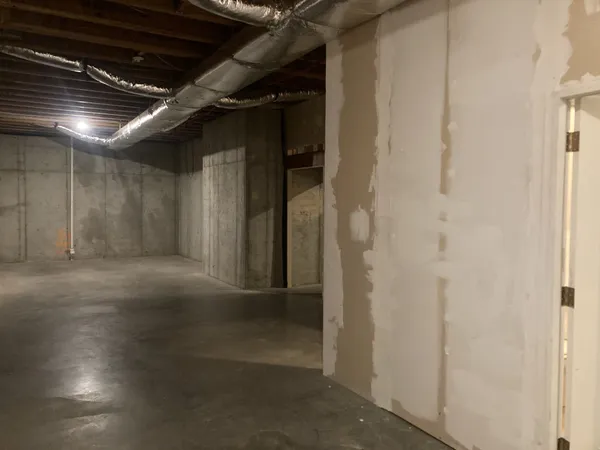 a view of empty room with windows