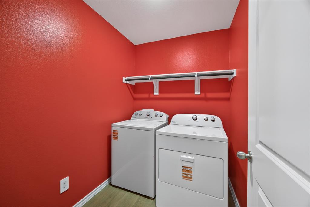 709 Chipper Trail Lavon, TX 75166 - Photo 13 of 17 a utility room with dryer and washer
