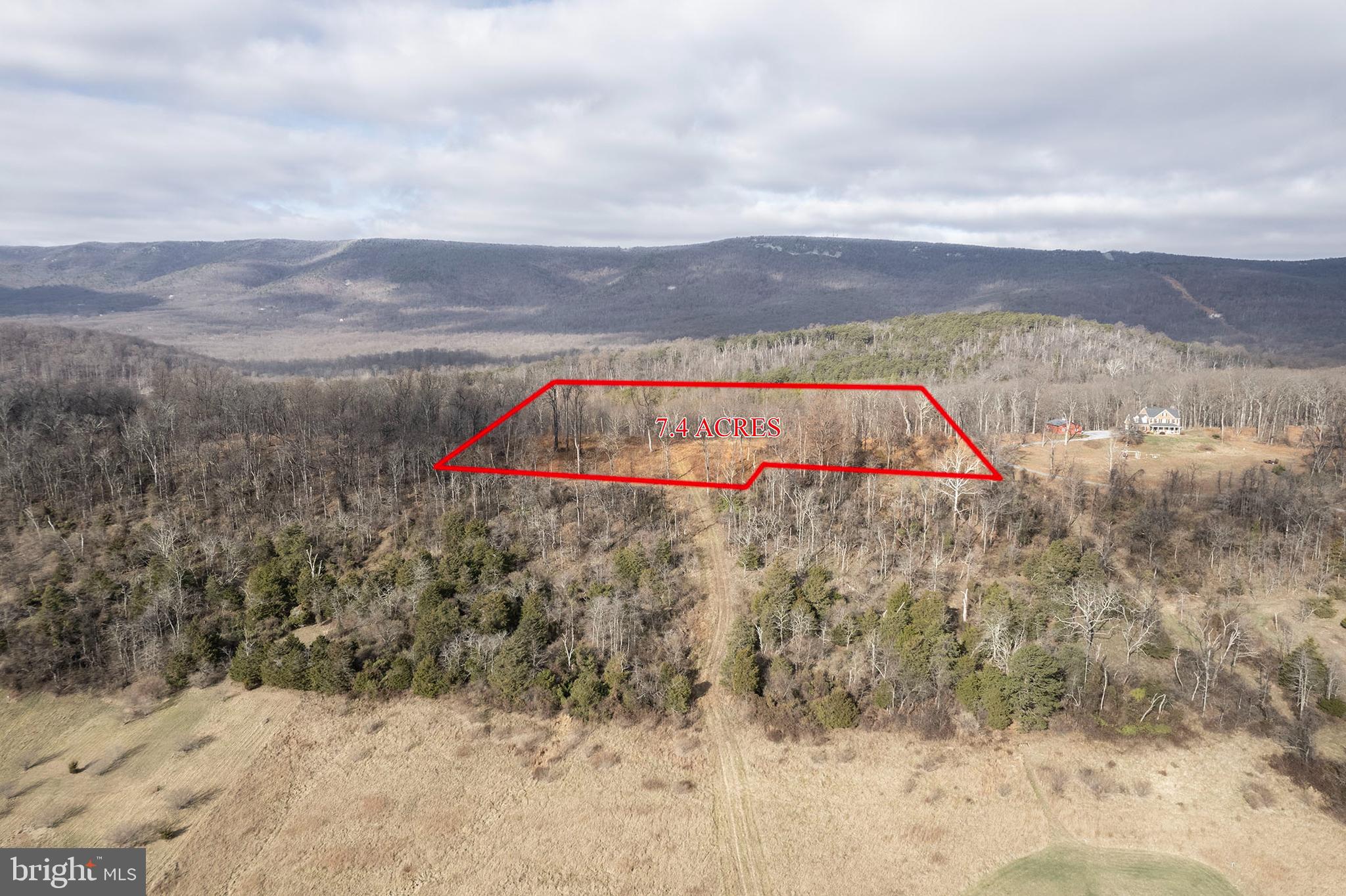 Back Mountain Road Winchester, VA 22602 - Photo 12 of 12 a view of a dry yard with wooden fence