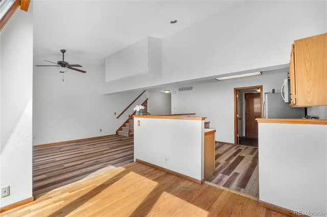 a view of a kitchen from the hallway