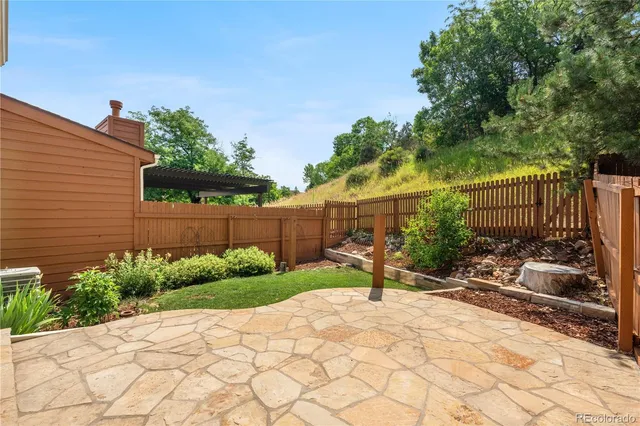 a view of a backyard with a slide