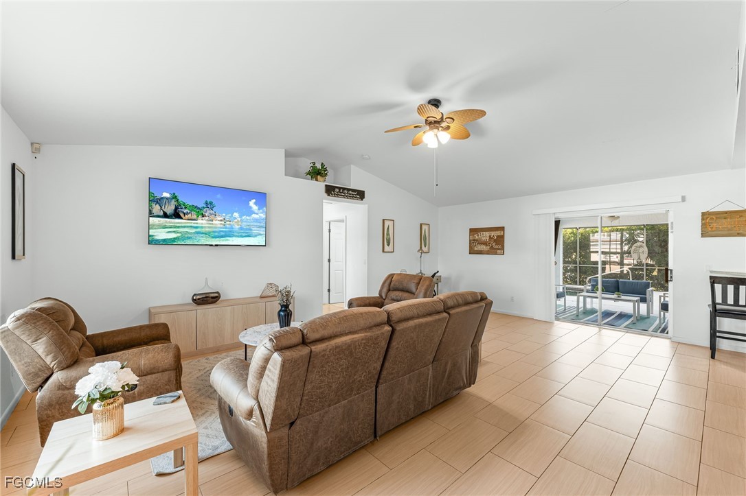 8468 Grove Road Fort Myers, FL 33967 - Photo 3 of 24 a living room with furniture flowerpot and a window