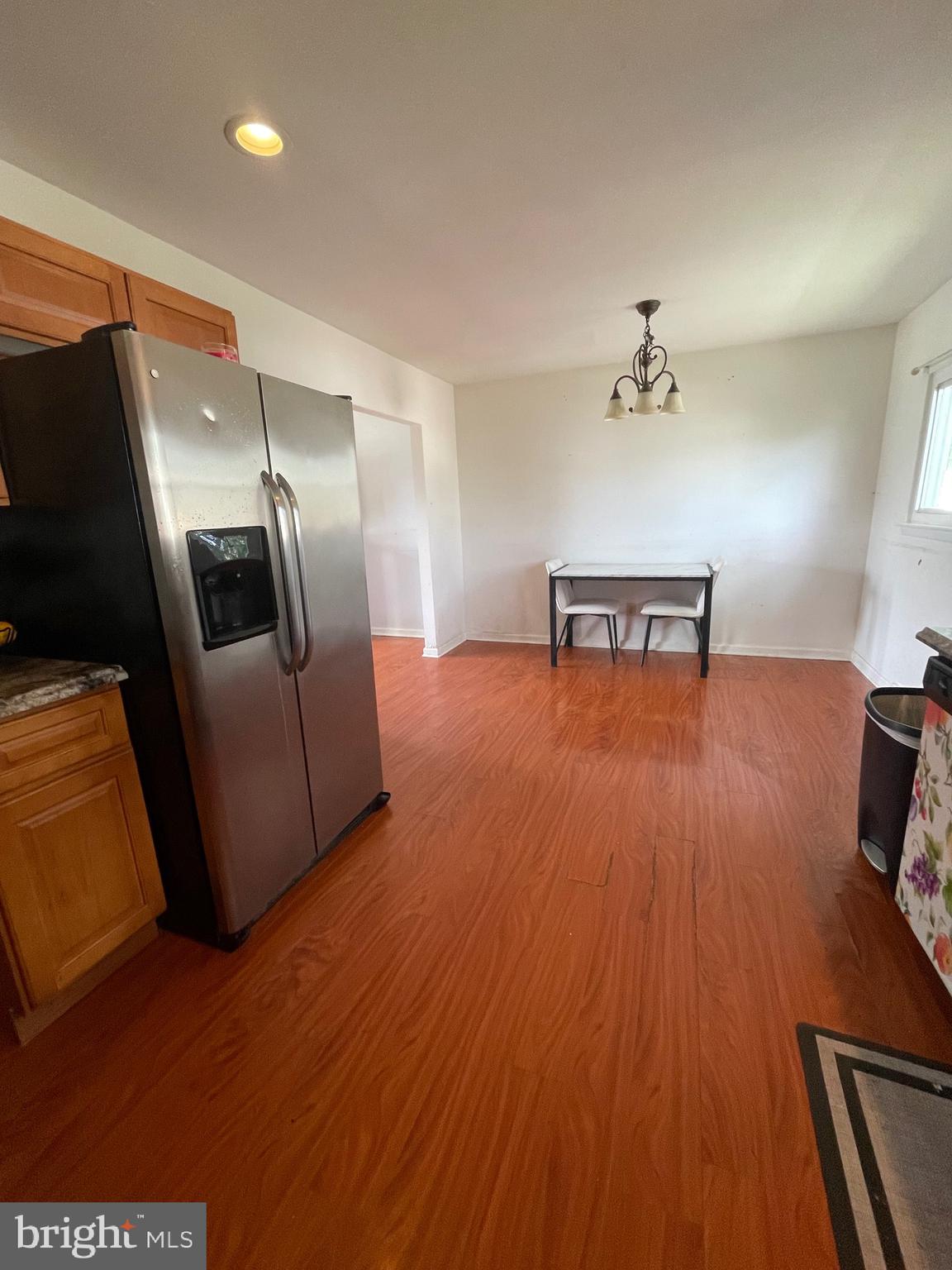 233 Rutgers Avenue Pemberton, NJ 08068 - Photo 6 of 8 a view of a livingroom with furniture and an empty room