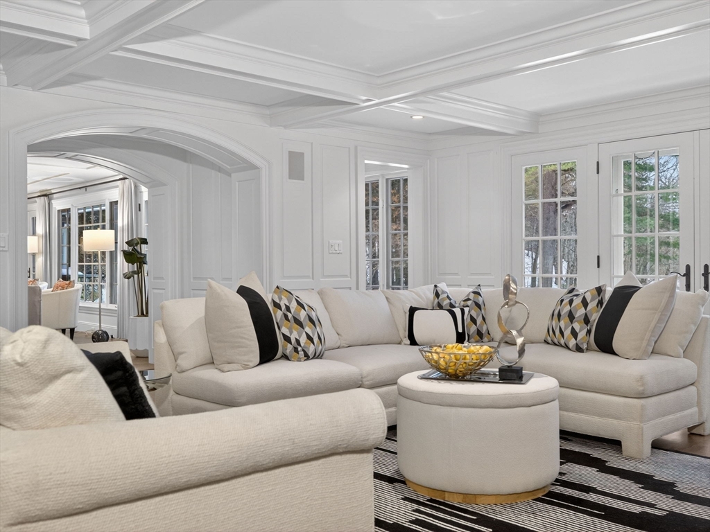 12 Winding River Circle Wellesley, MA 02482 - Photo 12 of 40 a living room with furniture and a large window