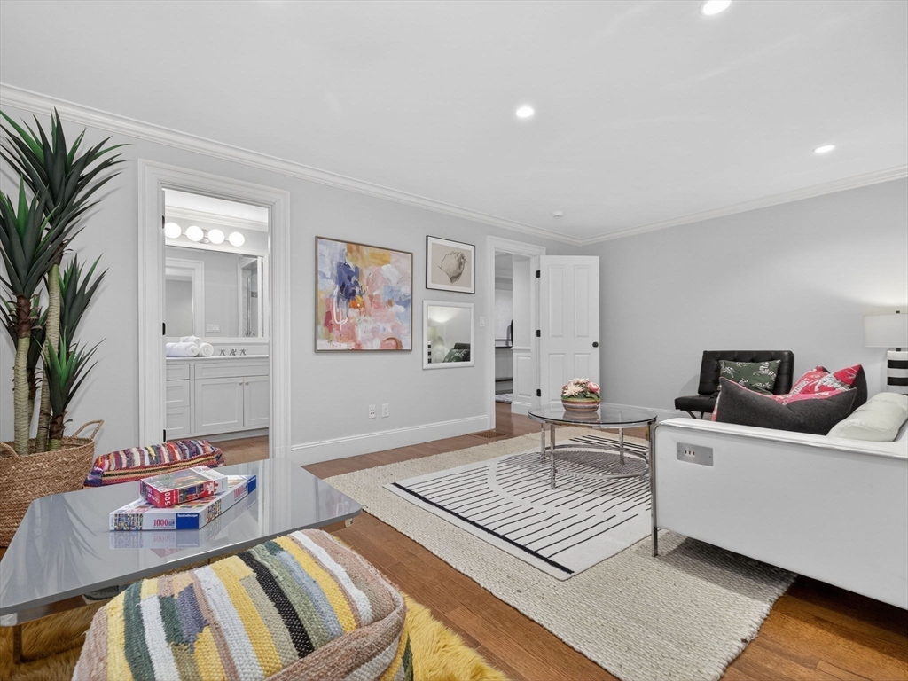12 Winding River Circle Wellesley, MA 02482 - Photo 18 of 40 a living room with furniture and a couch