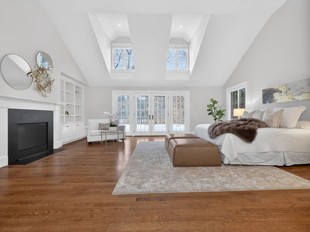 12 Winding River Circle Wellesley, MA 02482 - Photo 20 of 40 a living room with furniture and a fireplace