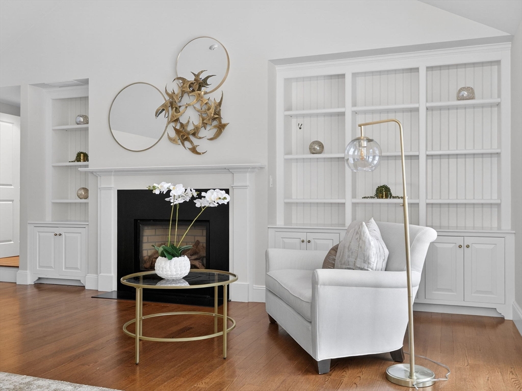 12 Winding River Circle Wellesley, MA 02482 - Photo 21 of 40 a living room with furniture and a wooden floor