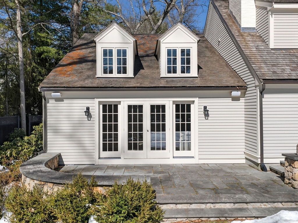 12 Winding River Circle Wellesley, MA 02482 - Photo 37 of 40 a front view of a house with garden