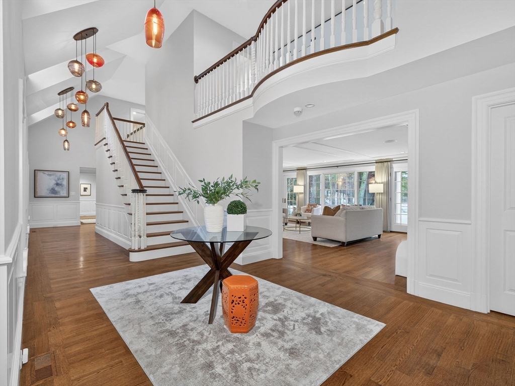 12 Winding River Circle Wellesley, MA 02482 - Photo 4 of 40 a living room with furniture and a wooden floor