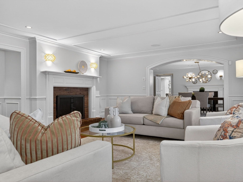 12 Winding River Circle Wellesley, MA 02482 - Photo 7 of 40 a living room with furniture and a fireplace