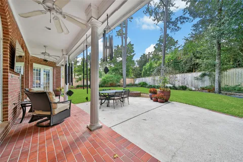 a view of yard with patio
