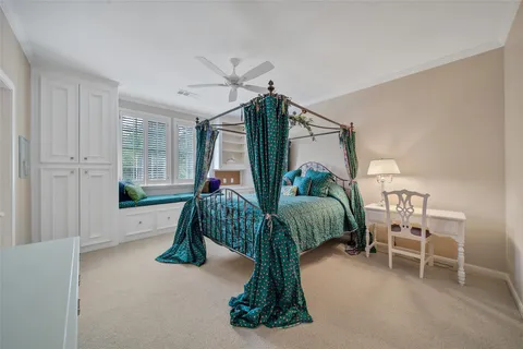 a living room with a couch and chairs