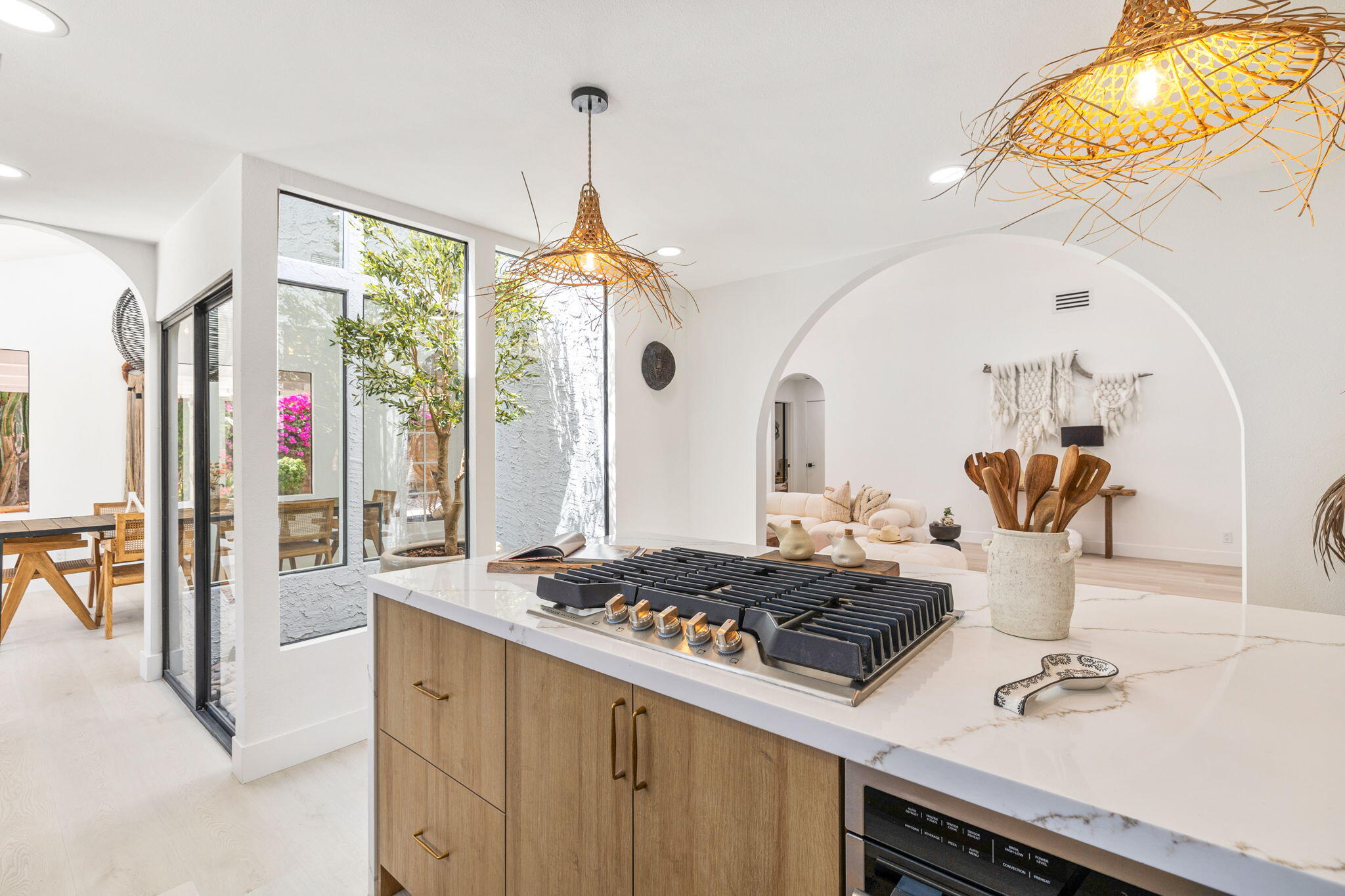 34 Lincoln Place Rancho Mirage, CA 92270 - Photo 17 of 52 a kitchen with a table and chairs in it