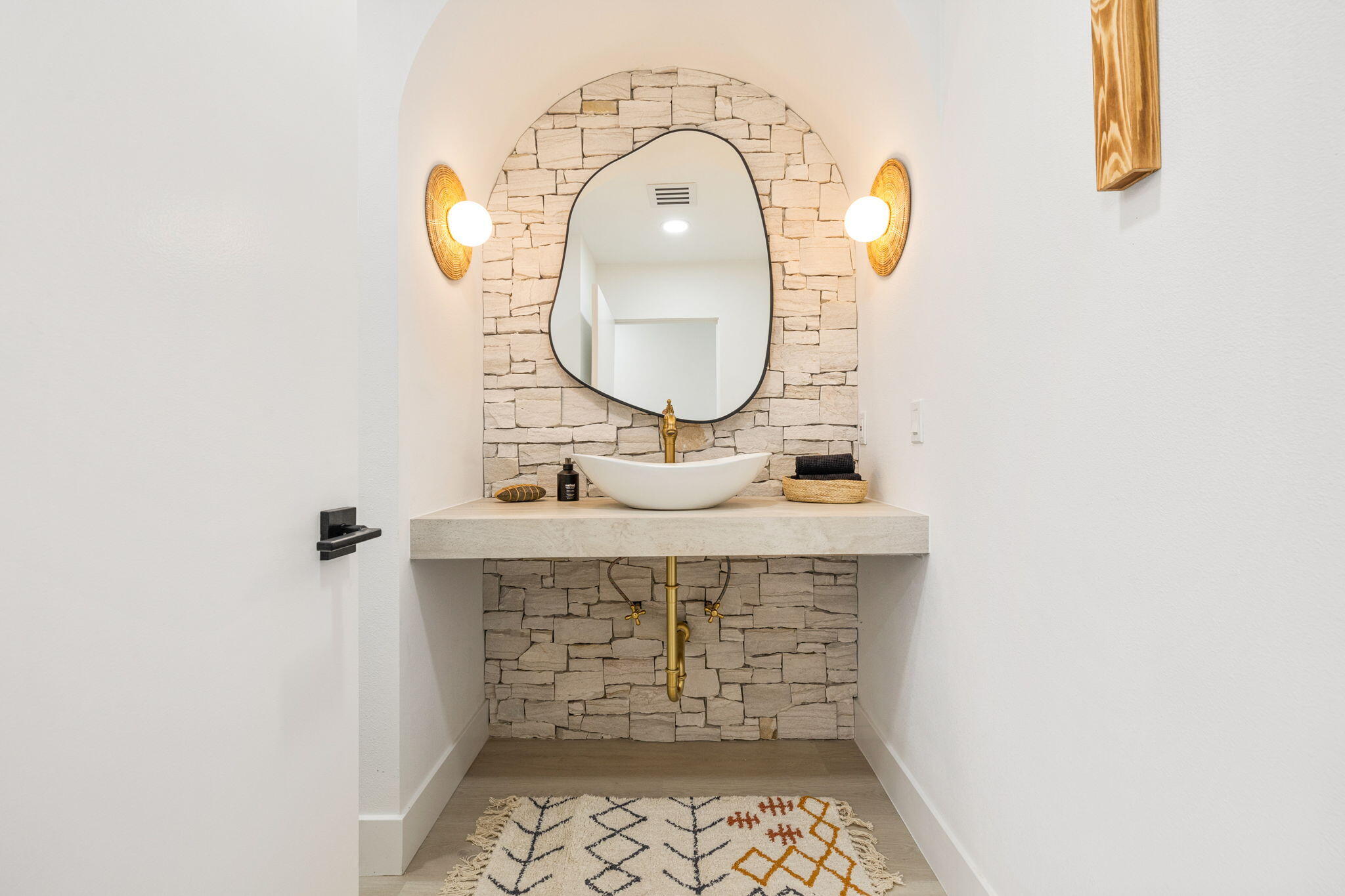 34 Lincoln Place Rancho Mirage, CA 92270 - Photo 25 of 52 a bathroom with a sink and a mirror