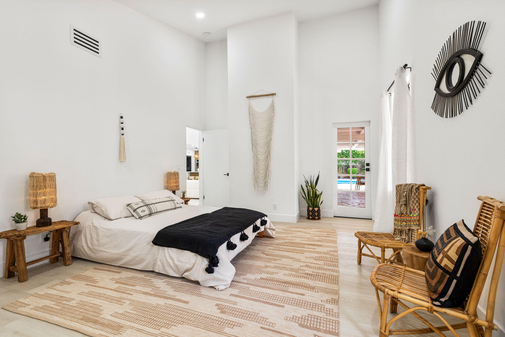 34 Lincoln Place Rancho Mirage, CA 92270 - Photo 30 of 52 a bedroom with furniture and a wooden floor