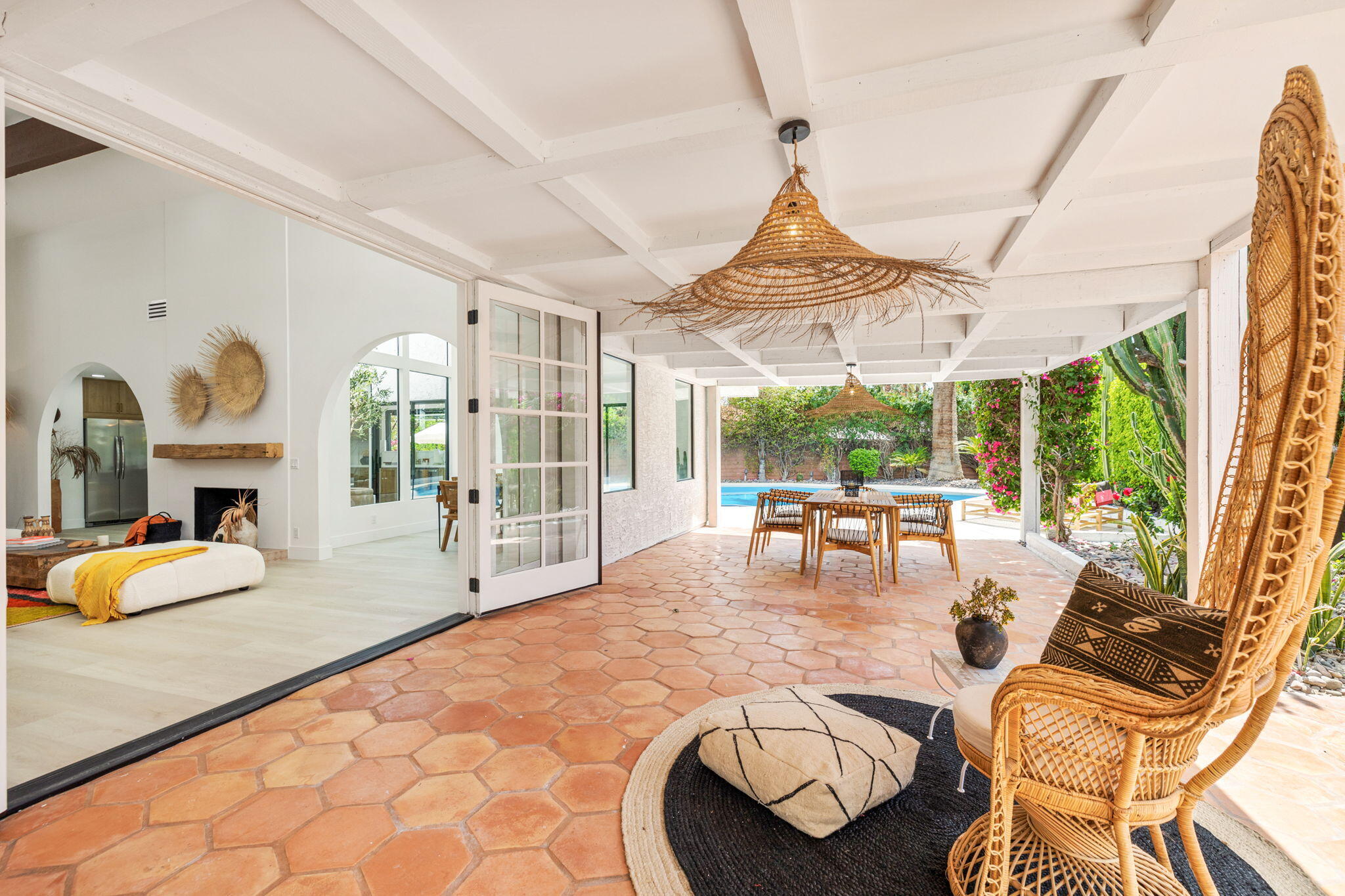 34 Lincoln Place Rancho Mirage, CA 92270 - Photo 36 of 52 a view of a dining room with furniture wooden floor and a chandelier