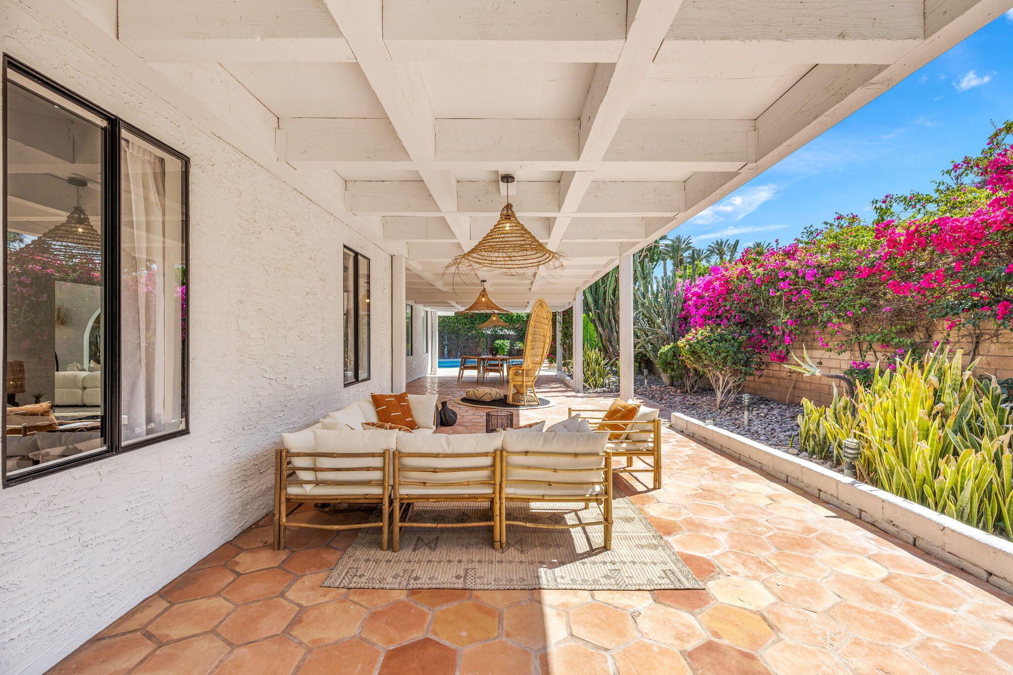 34 Lincoln Place Rancho Mirage, CA 92270 - Photo 38 of 52 a outdoor space with the couches and dining table view
