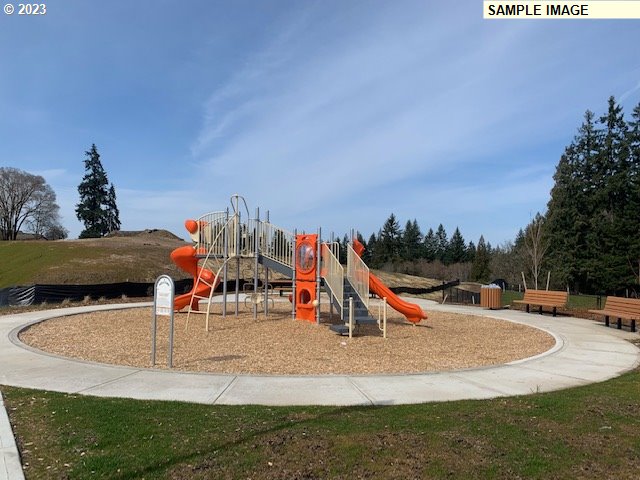 2711 South 9th Circle Ridgefield, WA 98642 - Photo 18 of 28 a view of outdoor space with playground and green space