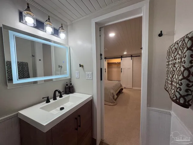 a view of a room with racks on the wall