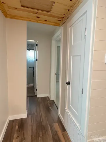 a view of a bathroom from a hallway