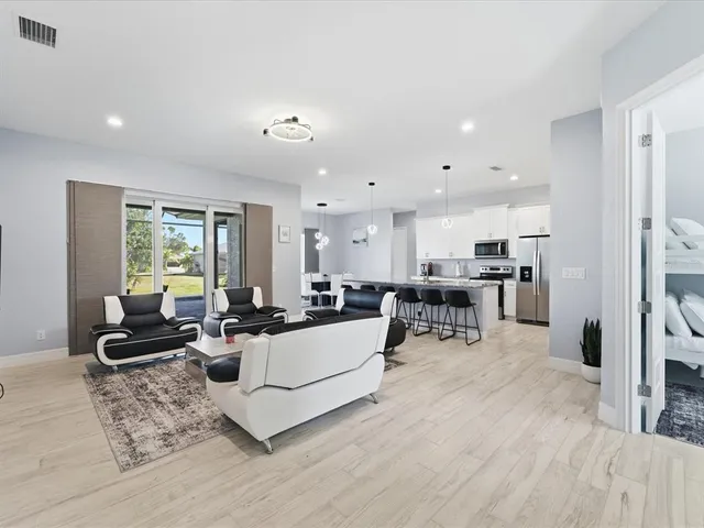 a living room with furniture and a table