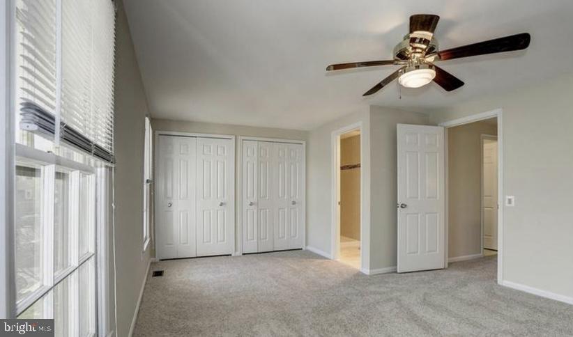 613 Concerto Lane Silver Spring, MD 20901 - Photo 13 of 23 a view of empty room with ceiling fan